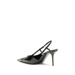 Black Leather PumpsGlossy leather Jeanne Pumps by Saint laurent combine bold elegance with iconic details. Featuring a silhouette with a square neckline and metal toe decorated with the hammered CASSANDRE monogram, they stand out for their refined and rec