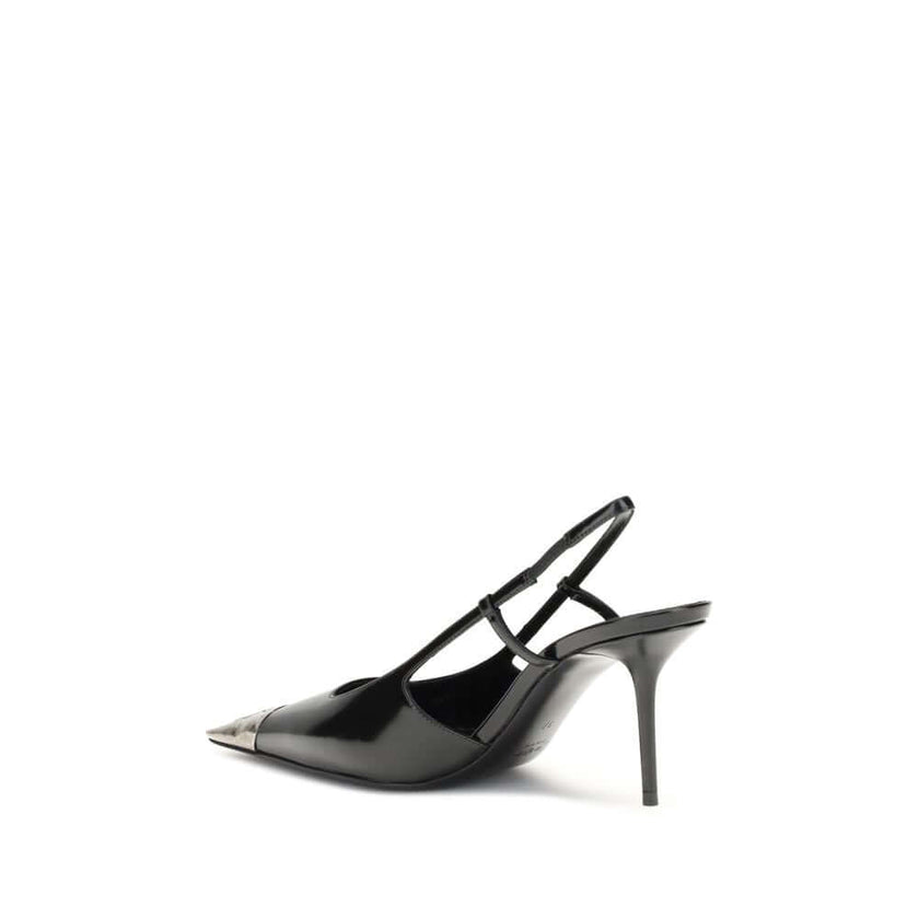 Black Leather PumpsGlossy leather Jeanne Pumps by Saint laurent combine bold elegance with iconic details. Featuring a silhouette with a square neckline and metal toe decorated with the hammered CASSANDRE monogram, they stand out for their refined and rec