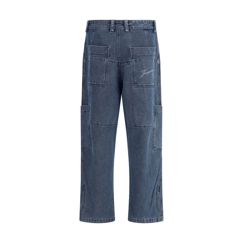 Blue Cotton Jeans DenimThe Le Cargo De-Nîmes Carré Jeans by Jacquemus reinterpret denim with a sculptural and contemporary approach. The wide, straight-leg cut pairs with functional details such as cargo pockets on the leg and back patch pockets featuring