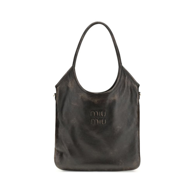 Brown Calf Leather Bos Taurus Shoulder BagIvy Shoulder Bag by Miu Miu made of soft, worn-effect leather features a double flat handle that allows comfortable shoulder carrying .The brand’s logo stands out on the front adding an iconic touch. The unlined i