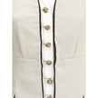 Silver Silk CoatThe Tailored Silk Jacket by Chloé reimagines classic elegance with refined details and a strong architectural touch. Its deep V-neckline is layered with a contrasting white placket, accentuated by gold-tone floral buttons for a luminous fi