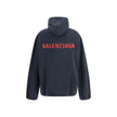 Black Cotton Denim JacketThe Layered Jacket by Balenciaga redefines layering with a modern twist. The front panel is crafted in denim, while the back and hood are made of soft sweatshirt fabric for a relaxed contrast. It features a classic collar, button-