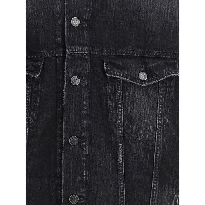 Black Cotton Denim JacketThe Layered Jacket by Balenciaga redefines layering with a modern twist. The front panel is crafted in denim, while the back and hood are made of soft sweatshirt fabric for a relaxed contrast. It features a classic collar, button-