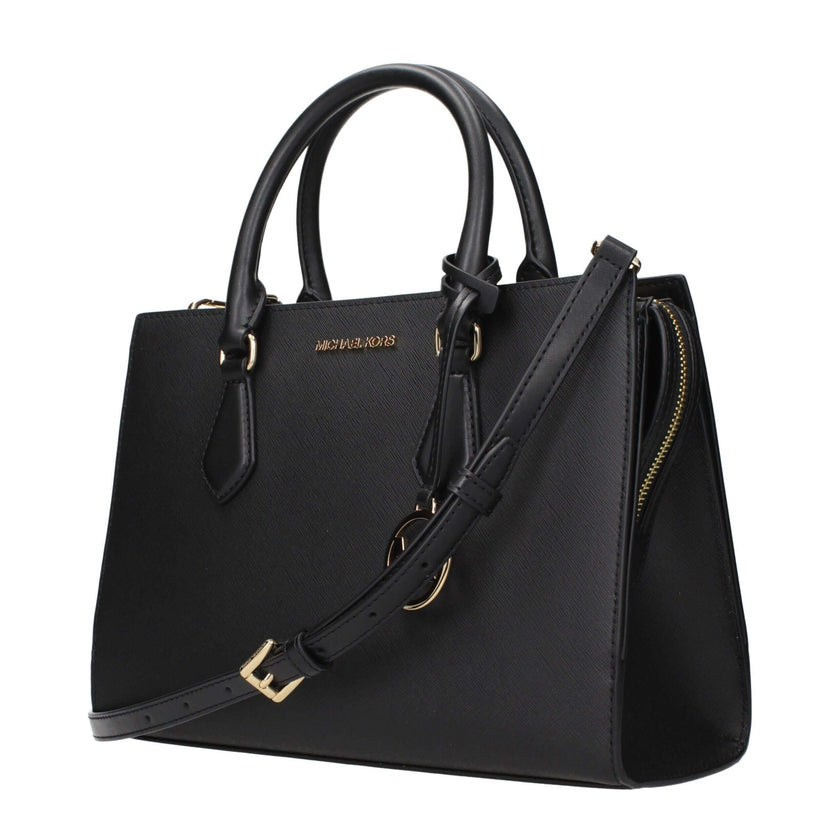 Black Fabric HandbagDescription: The product with MPN 35S3G6HS2LBLACK and code F85169 fabric in black is a handbags designed by Michael Kors. It has features like front logo, removable details, adjustable shoulder, removable shoulder, divider inner pocket