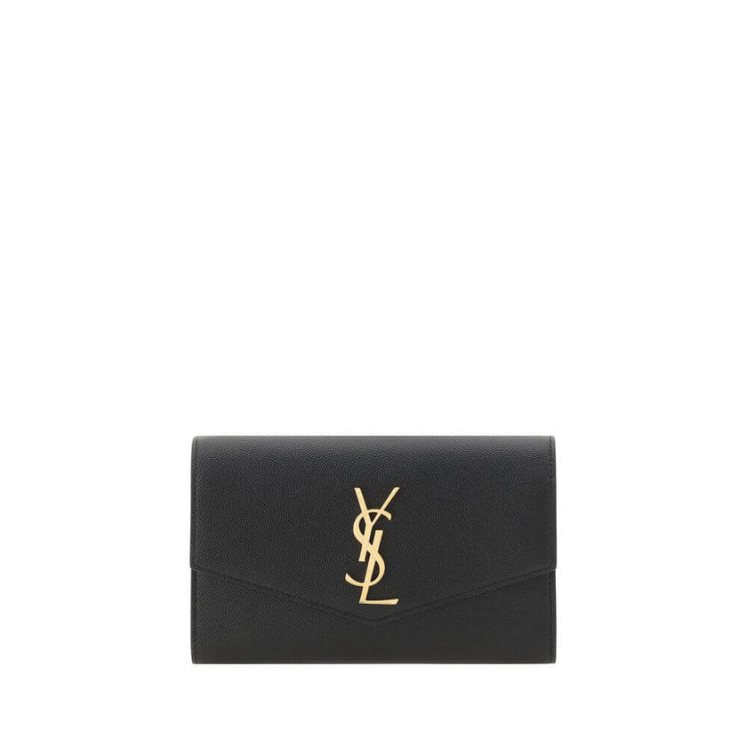 Black Calf Leather Bos Taurus Shoulder BagSaint Laurent’s leather chain Wallet is a compact and sophisticated accessory, perfect for hand-held or worn on the shoulder. Crafted from smooth leather, it features a magnetic button closure and a removable chai
