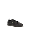 Black Calf Leather Bos Taurus SneakersLeather Sneakers by Prada combine elegance and urban style in an essential and sophisticated design. Featuring a lace-up closure and a flat sole, they feature a paneled pattern that adds depth to the profile. The gold