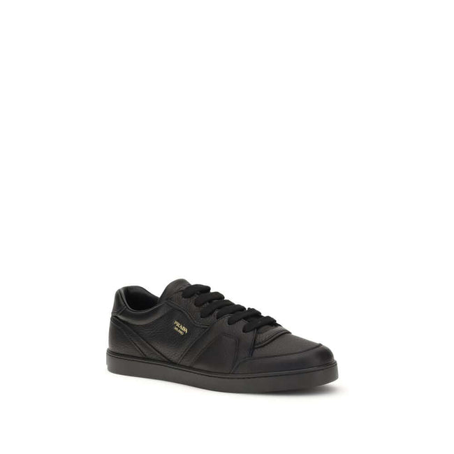 Black Calf Leather Bos Taurus SneakersLeather Sneakers by Prada combine elegance and urban style in an essential and sophisticated design. Featuring a lace-up closure and a flat sole, they feature a paneled pattern that adds depth to the profile. The gold