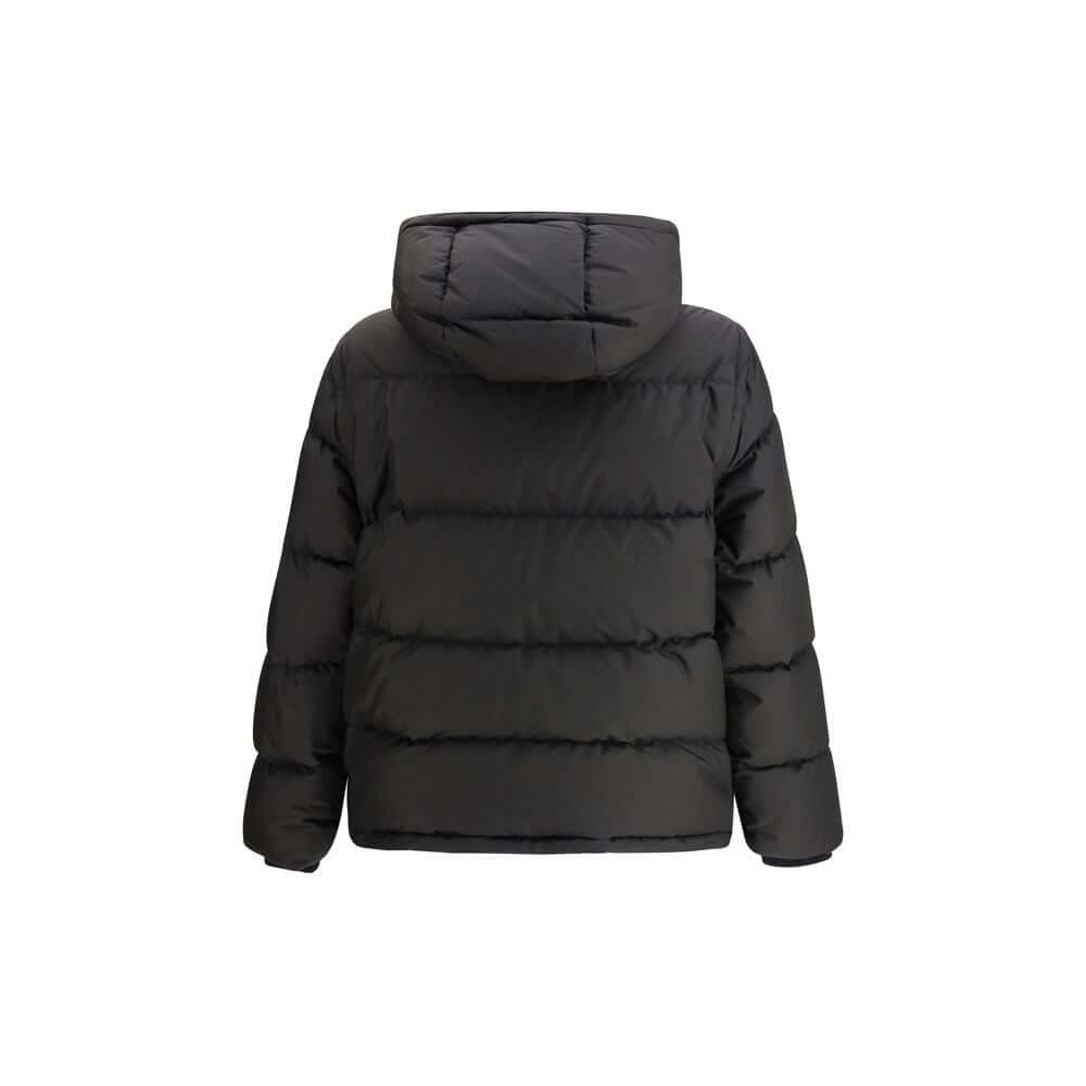 Black Polyester ClothingThe Puffer Jacket by Burberry merges technical innovation with timeless heritage. Filled with goose down and insulating fibres, it offers warmth and lightness in equal measure. Detachable sleeves transform the piece into a gilet, e