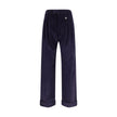 Blue Cotton PantsThe cotton corduroy Trousers by Burberry embody the authentic spirit of British elegance, reinterpreted with a modern sensibility. The relaxed cut with triple pleats and turn-up cuffs creates a refined, easy silhouette, while the hook, bu