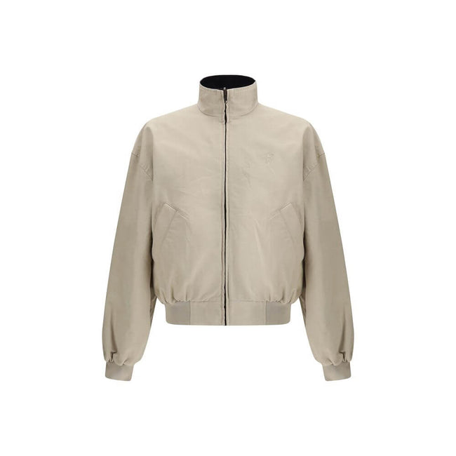 Blue Cotton BomberThe reversible cotton Blouson by Balenciaga embodies contemporary elegance through clean lines and refined minimalism. Bold proportions and precise tailoring showcase the Maison’s mastery, opting for a silhouette defined by structure rat