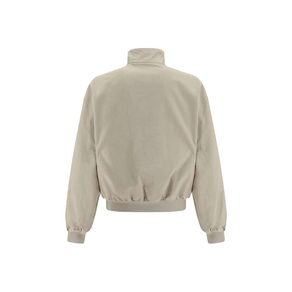 Blue Cotton BomberThe reversible cotton Blouson by Balenciaga embodies contemporary elegance through clean lines and refined minimalism. Bold proportions and precise tailoring showcase the Maison’s mastery, opting for a silhouette defined by structure rat