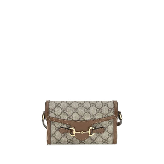 Brown Polyethylene Shoulder BagGucci’s Horsebit mini 1955 Shoulder Bag combines elegance and sustainability thanks to the beige and ebony GG Supreme fabric, made from materials with reduced environmental impact. Enhanced with brown leather trim and gold-t