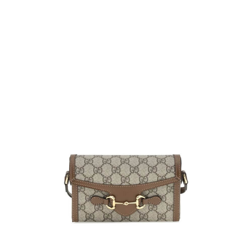 Brown Polyethylene Shoulder BagGucci’s Horsebit mini 1955 Shoulder Bag combines elegance and sustainability thanks to the beige and ebony GG Supreme fabric, made from materials with reduced environmental impact. Enhanced with brown leather trim and gold-t