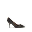 Black Leather High Heel PumpsPrada’s leather Pumps are an elegant model with retro appeal, made of leather with a vintage effect. The pointed silhouette is enhanced by the laminated printed logo on the instep, a distinctive and sophisticated detail. The d