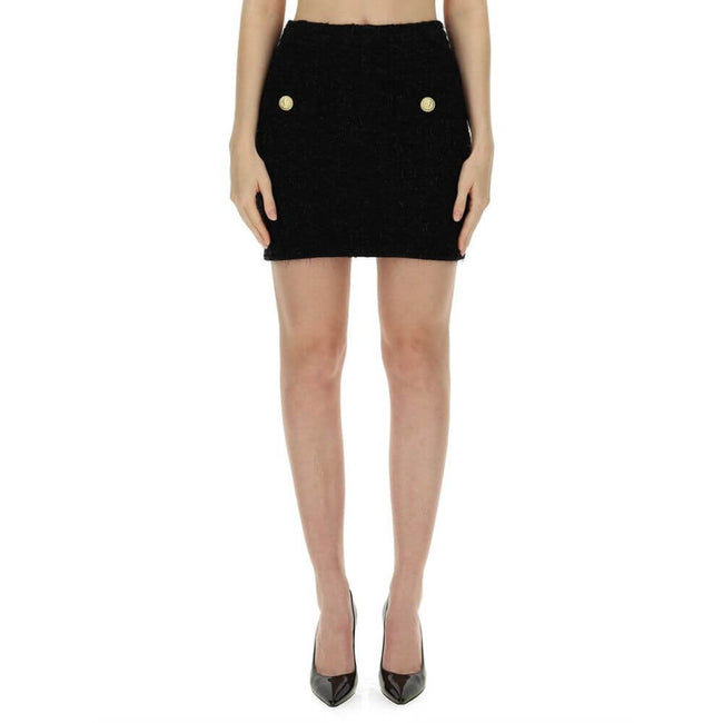 Black Cotton Mini SkirtDescription: – Composition: 25% Cotton 36% Polyamide 7% Polyester 32% Viscose – Back zip closure – Dry clean – Two gold-tone button detail – Gender: WOMEN – Size & Fit: THE MODEL IS 180 CM TALL AND WEARS A SIZE 38 FR. REGULAR FIT.Bl