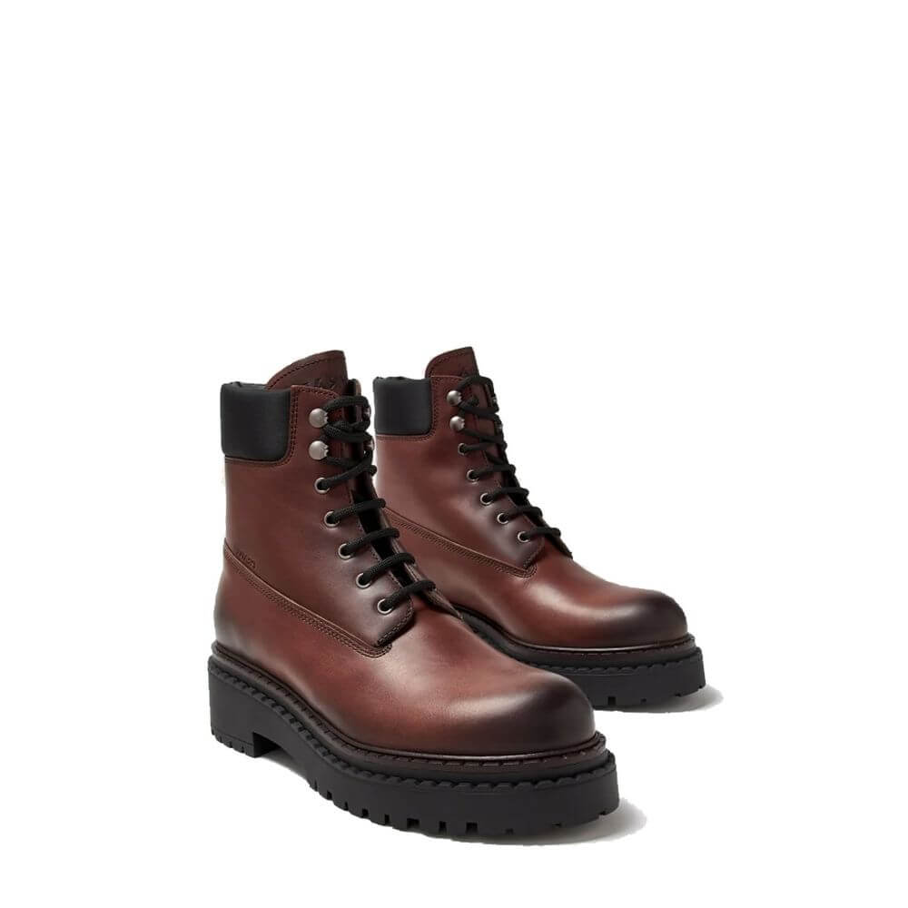Brown Calfskin Lace-Up BootsDescription: – Composition: 100% calf leather – Inner: Leather – Insole: Leather – Sole: Rubber – Round toe – Front lace-up closure – Side logo detail – Metal eyelets – Re-Nylon accents – Stamped notch effect sole – Hot-stamped