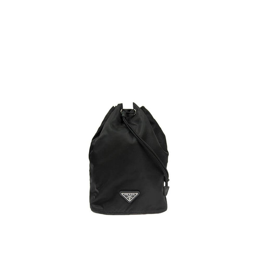 Black Nylon HandbagDescription: – Composition: 100% Nylon – Leather detail – Width 10 cm – Drawstring closure – Length 19 cm – Height 22 cm – Front enamelled metal triangle logo – No handle – No shoulder strap – Made in Turkey – Gender: WOMEN –Black Nylon