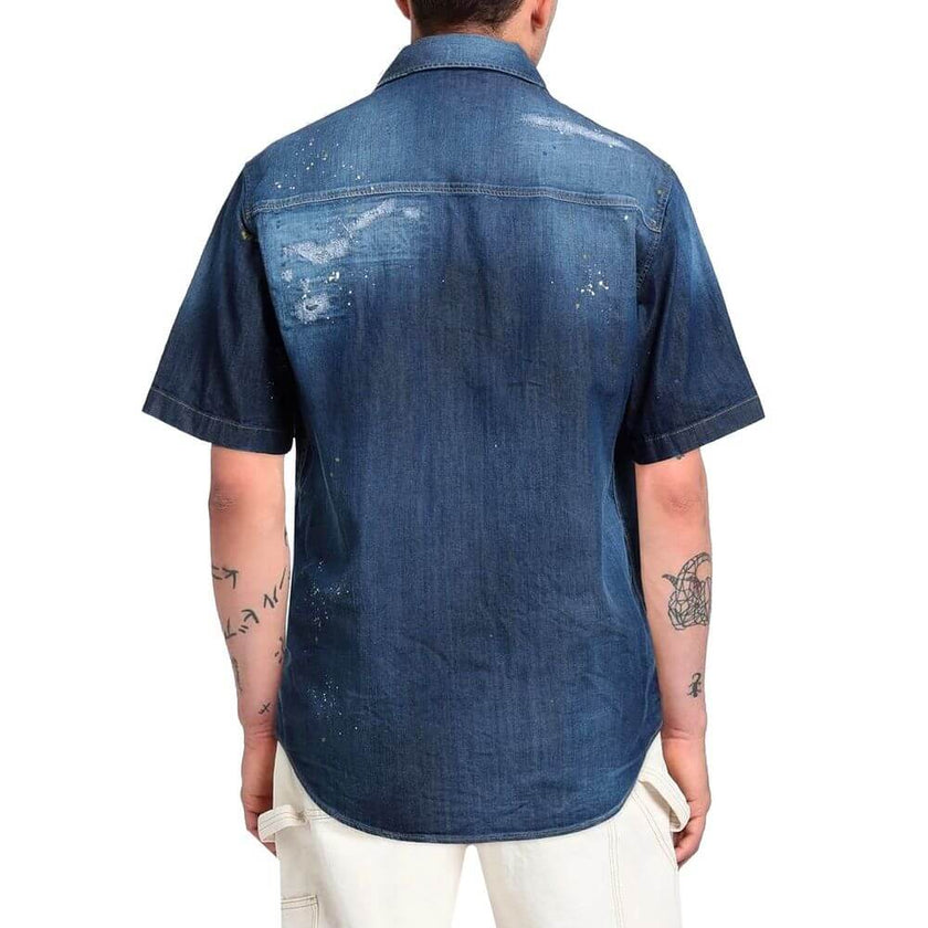 Blue Denim ShirtDescription: – Composition: 98% Cotton 2% Elastane – Front button closure – Short sleeve – Shirt collar – Made in Italy – Gender: MEN –Blue Denim Shirt${tagsDsquared²Aulae Blue Denim Shirt Dsquared²Aulae Blue Denim Shirt Description: – Com