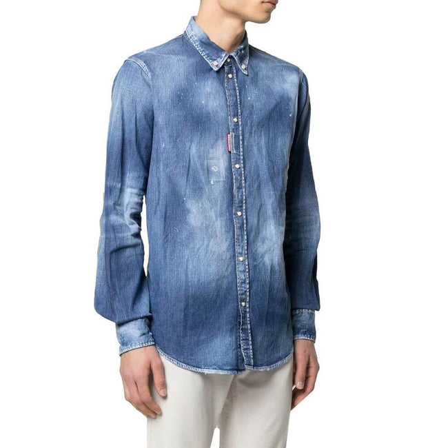 Blue Denim ShirtDescription: – Composition: 98% Cotton 2% Elastane – Long sleeves – Shirt collar – Press button closure – Made in Italy – Gender: MEN –Blue Denim Shirt${tagsDsquared²Aulae Blue Denim Shirt Dsquared²Aulae Blue Denim Shirt Description: – Com
