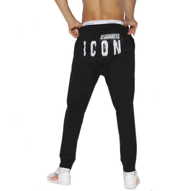 Black Cotton Joggers (Workout Pants)Description: – Composition: 100% Cotton – Elasticated waist – Two side pockets – Back contrast logo detail – Machine wash – Ribbed cuffs – Made in Italy – Gender: MEN –Black Cotton Joggers (Workout Pants)${tagsDsquared²