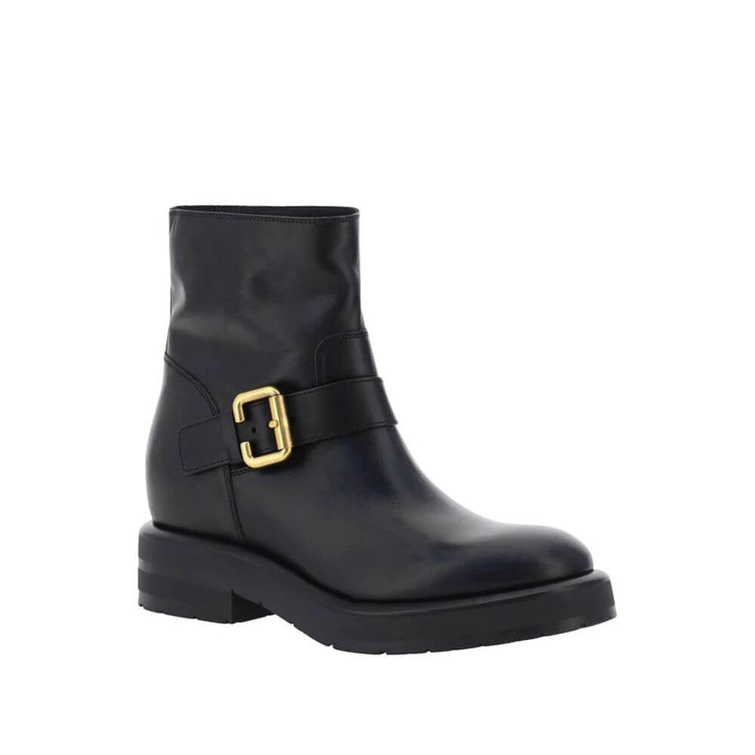 Black Calfskin Ankle BootsDescription: – Composition: 100% calf leather – Sole: 100% Rubber – Round toe – Slip on – Secondary lining: suede kidskin – Made in Italy – Gender: WOMEN –Black Calfskin Ankle Boots${tagsChloéAulae Black Calfskin Ankle Boots Chlo