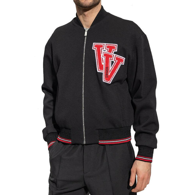 Black Virgin Wool BomberDescription: – Composition: 100% Virgin wool – Long sleeves – Ribbed trims – Back logo detail – Hand wash – Front zip closure – Front patch logo detail – Made in Italy – Gender: MEN –Black Virgin Wool Bomber${tagsVersaceAulae Black