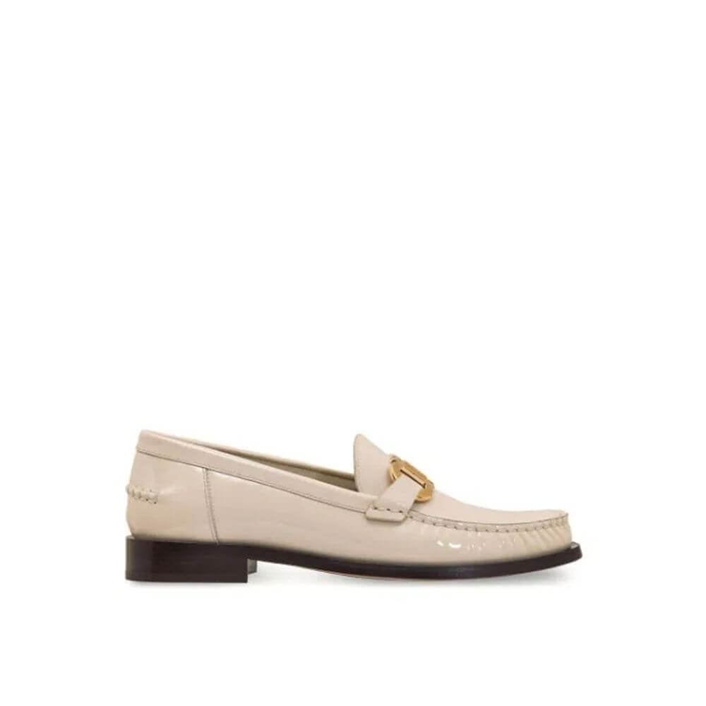 White Calfskin Slip-On LoafersDescription: – Composition: 100% calf leather – Inner: Leather – Insole: Leather – Sole: Leather – Round toe – Patent effect – Gold-tone logo hardware – Slip-on design – Made in Italy – Gender: WOMEN –White Calfskin Slip-On L