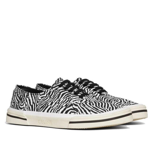 Black Canvas Low Top SneakersDescription: – Composition: 100% Canvas – Inner: Cotton – Insole: Cotton – Sole: 100% Rubber – Round toe – Lace-up – Embossed logo detail – Zebra print – Made in Spain – Gender: MEN –Black Canvas Low Top Sneakers${tagsCelineBl