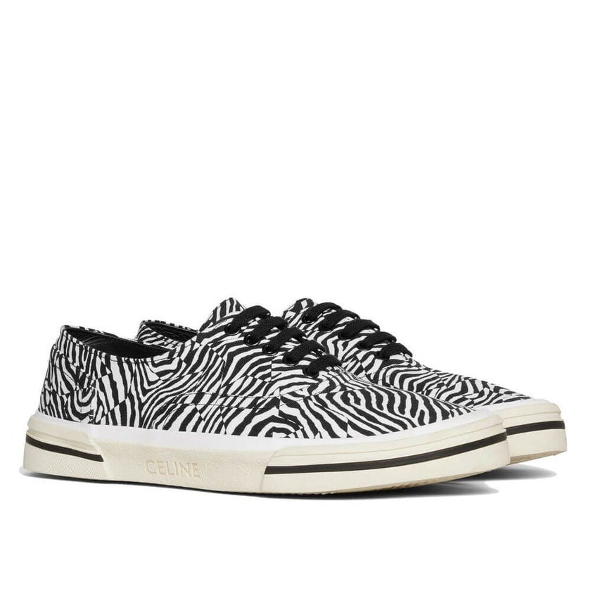 Black Canvas Low Top SneakersDescription: – Composition: 100% Canvas – Inner: Cotton – Insole: Cotton – Sole: 100% Rubber – Round toe – Lace-up – Embossed logo detail – Zebra print – Made in Spain – Gender: MEN –Black Canvas Low Top Sneakers${tagsCelineBl