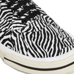Black Canvas Low Top SneakersDescription: – Composition: 100% Canvas – Inner: Cotton – Insole: Cotton – Sole: 100% Rubber – Round toe – Lace-up – Embossed logo detail – Zebra print – Made in Spain – Gender: MEN –Black Canvas Low Top Sneakers${tagsCelineBl