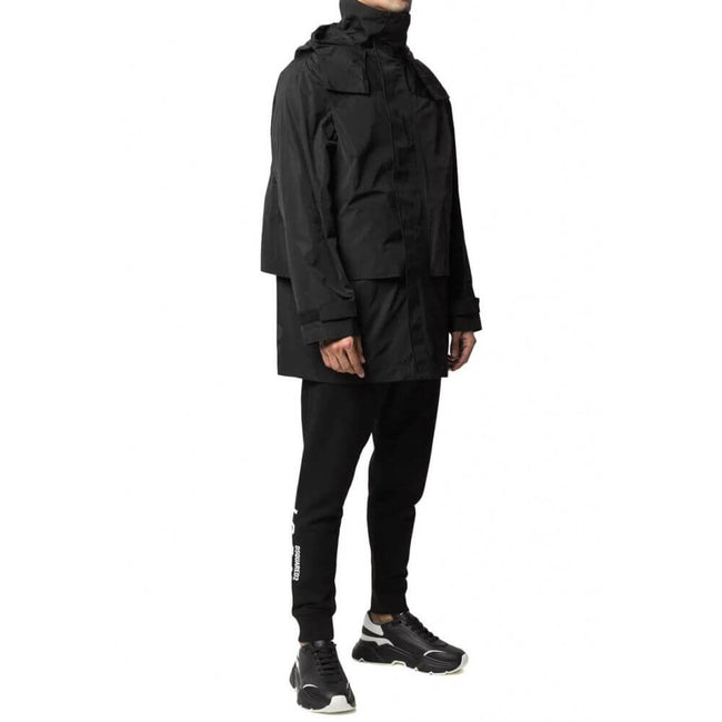 Black Nylon Rain CoatDescription: – Composition: 100% nylon – fully lined – front zip and velcro strap closure – non detachable hood – two zipped pockets – back logo detail – machine wash – made in Italy –Black Nylon Rain Coat${tagsDsquared²Black Nylon Ra