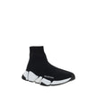 Black Polyester Athletic SneakersSpeed Sneakers by Balenciaga feature an elongated toe and a sock-like design that ensures a snug, modern fit. The contrasting printed logo on the outer side adds a recognizable style detail, making these sneakers a perfect