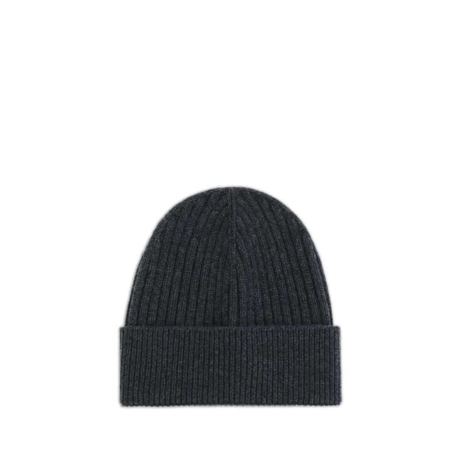 Black Merino Wool BeanieBeanie Hat by Moncler Grenoble combines functionality and style in an essential cold-weather accessory. Made with ribbed fabrication, it offers a snug and comfortable fit. The Moncler Grenoble logo sewn on the front adds a distinct
