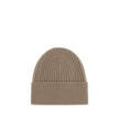 Beige Merino Wool BeanieBeanie Hat by Moncler Grenoble combines functionality and style in an essential cold-weather accessory. Made with ribbed fabrication, it offers a snug and comfortable fit. The Moncler Grenoble logo sewn on the front adds a distinct