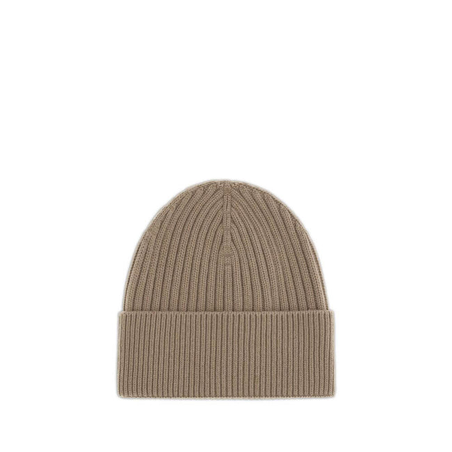 Beige Merino Wool BeanieBeanie Hat by Moncler Grenoble combines functionality and style in an essential cold-weather accessory. Made with ribbed fabrication, it offers a snug and comfortable fit. The Moncler Grenoble logo sewn on the front adds a distinct
