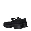 Black Fibres MulesDescription: The product with MPN 1F111OYZU050F0002 and code F84311 net in black is a sneakers designed by Prada. It has features like front logo, back logo. Additional Info: Style: Casual Closing type: Strap Closure Shoe sole: Rubber He