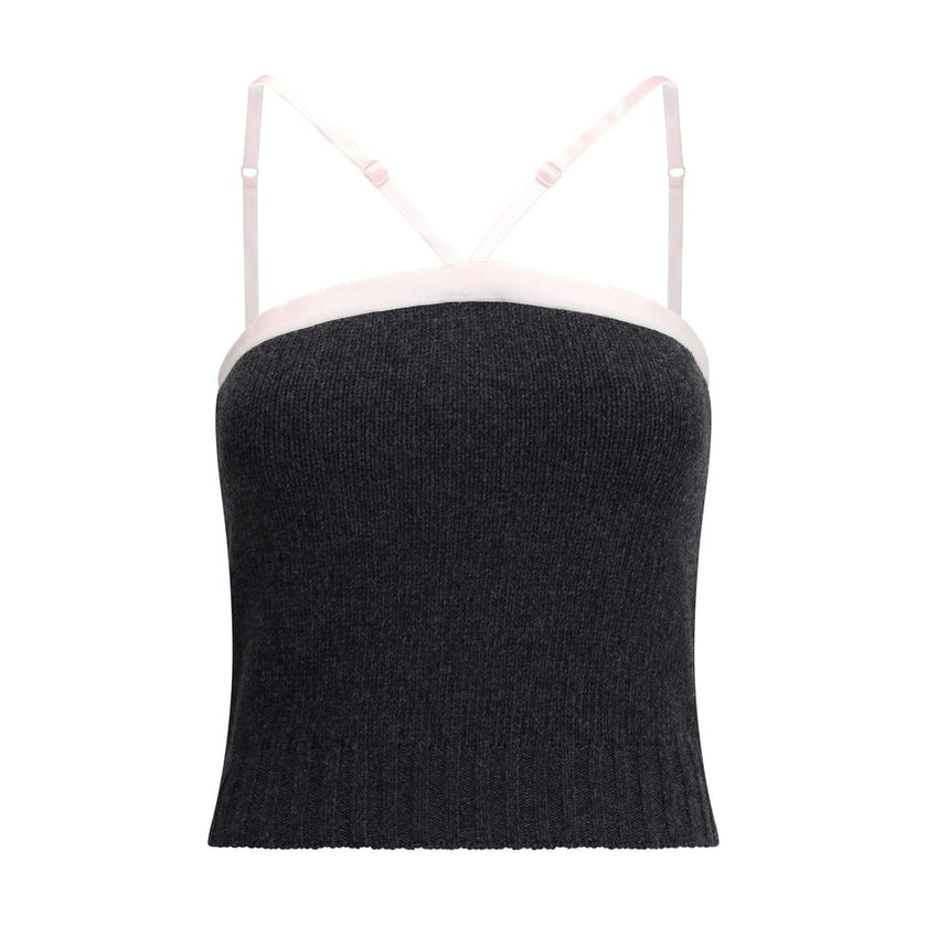 Gray Fleece Wool TopPrada’s virgin wool crop Top combines simplicity and style in an essential piece. Featuring thin, adjustable straps, it has a ribbed hem that enhances the silhouette. The triangular logo on the front adds a distinctive and refined deta