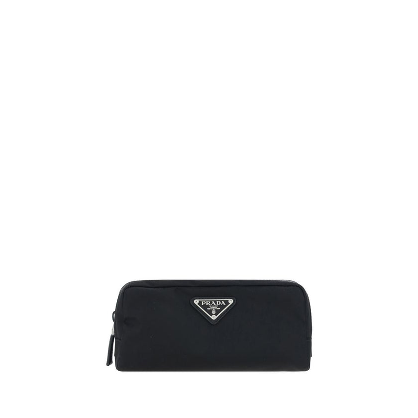Black Recycled Polyamide AccessoriesRe-Nylon Beauty Case by Prada, top zipper closure, triangular logo plaque applied to front, leather details. Season: AW25 Dimension: 20x20x8 Composition: 100% Recycled Polyamide MADE IN ITALYBlack Recycled Polyamide Acc