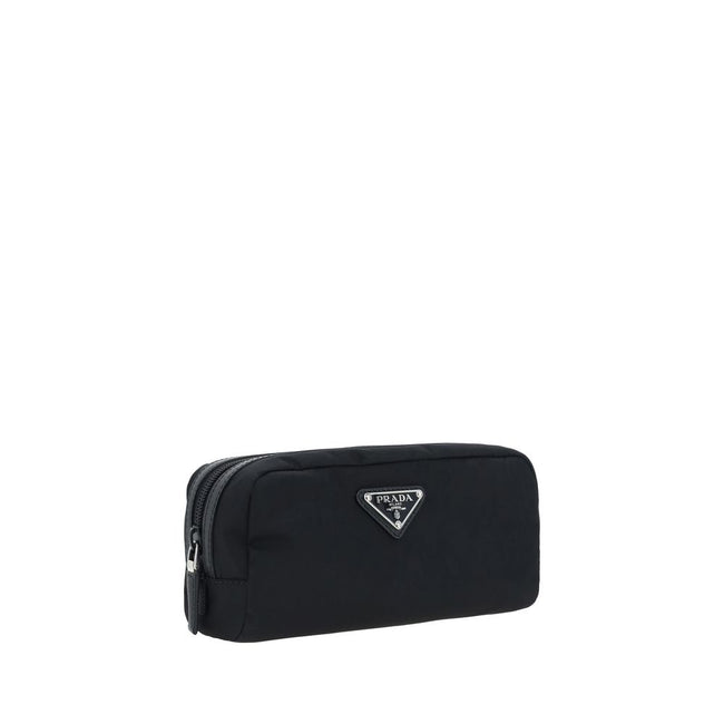 Black Recycled Polyamide AccessoriesRe-Nylon Beauty Case by Prada, top zipper closure, triangular logo plaque applied to front, leather details. Season: AW25 Dimension: 20x20x8 Composition: 100% Recycled Polyamide MADE IN ITALYBlack Recycled Polyamide Acc