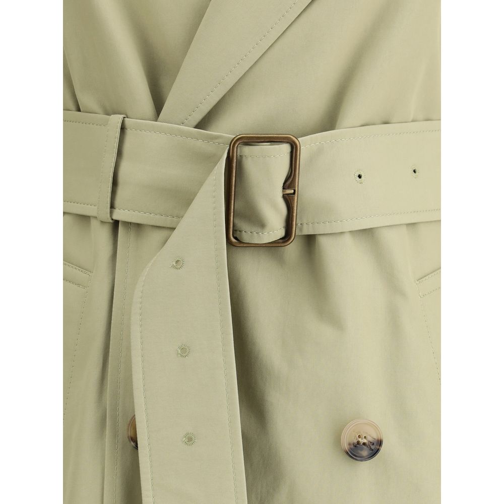 Beige Cotton Trench CoatThe Burberry cotton Trench Coat features wide notch lapels and a double-breasted front fastening with buttons, which enhance its timeless elegance. The two side welt pockets add a practical and refined touch, while a vent at the ba