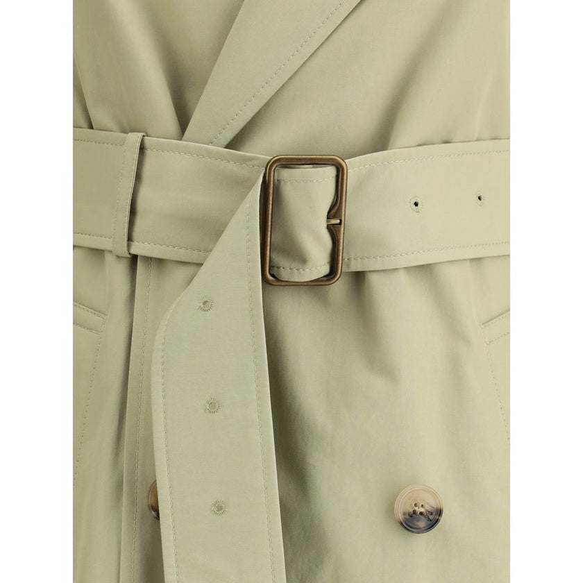 Beige Cotton Trench CoatThe Burberry cotton Trench Coat features wide notch lapels and a double-breasted front fastening with buttons, which enhance its timeless elegance. The two side welt pockets add a practical and refined touch, while a vent at the ba