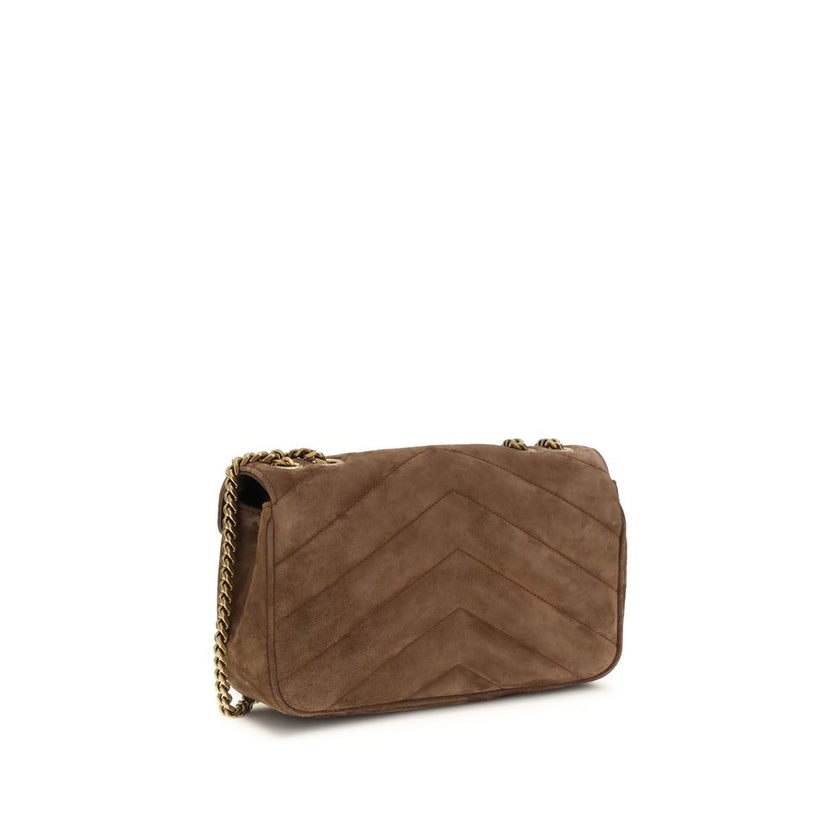 Brown Calf Leather Bos Taurus Shoulder BagThe small LouLou Shoulder Bag in matelassé suede by Saint Laurent is an iconic accessory, featuring the elegant chevron pattern that gives the design a sophisticated texture. This bag includes a removable leather