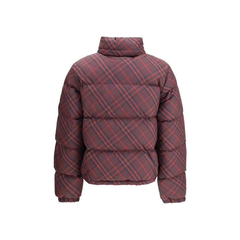 Red Polyester CoatThe Check Ambleside Puffer Jacket by Burberry combines the House’s iconic Check pattern with a contemporary technical design. Cut to a regular fit, it features a two-way B-cut zip closure and a packaway drawcord hood. Side zip pockets, e
