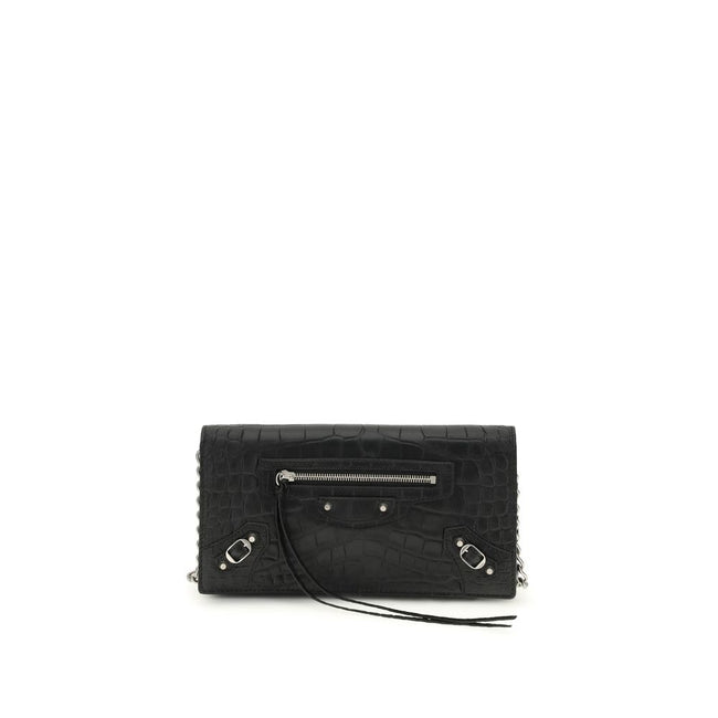 Black Calf Leather Bos Taurus Shoulder BagThe crocodile Effect Shoulder Bag by Balenciaga is an elegant and distinctive accessory featuring a refined crocodile effect that adds luxurious texture. The iconic buckles on the front and zipper pocket offer uni
