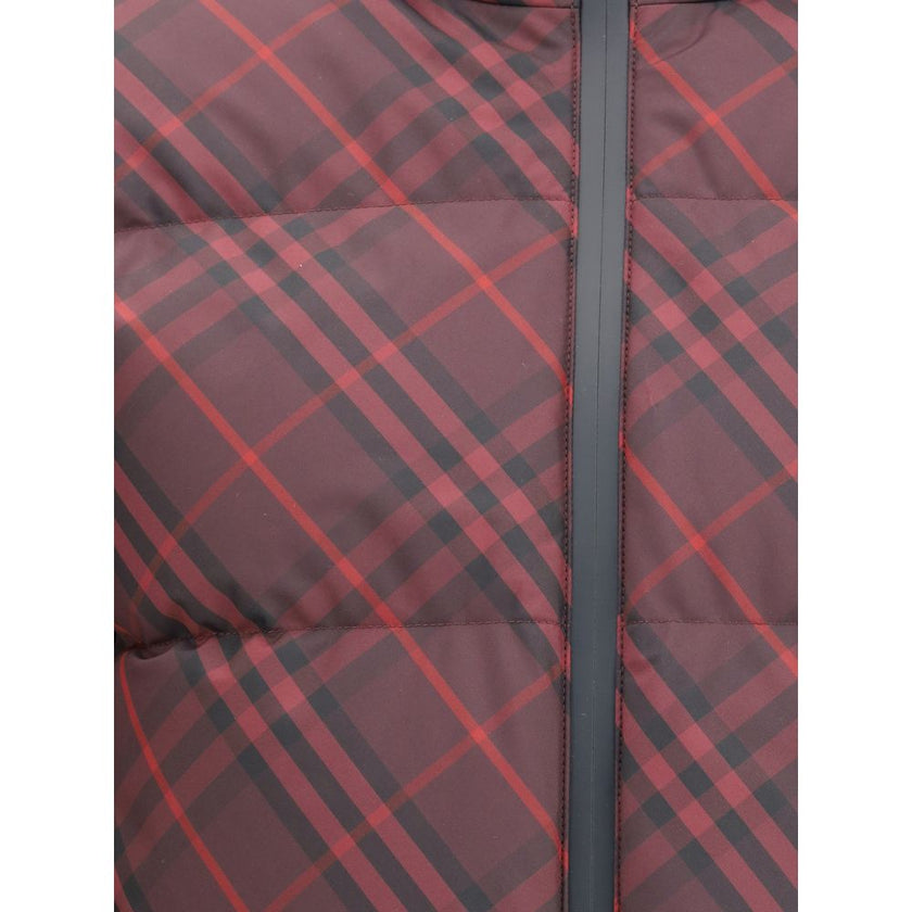 Red Polyester CoatThe Check Ambleside Puffer Jacket by Burberry combines the House’s iconic Check pattern with a contemporary technical design. Cut to a regular fit, it features a two-way B-cut zip closure and a packaway drawcord hood. Side zip pockets, e