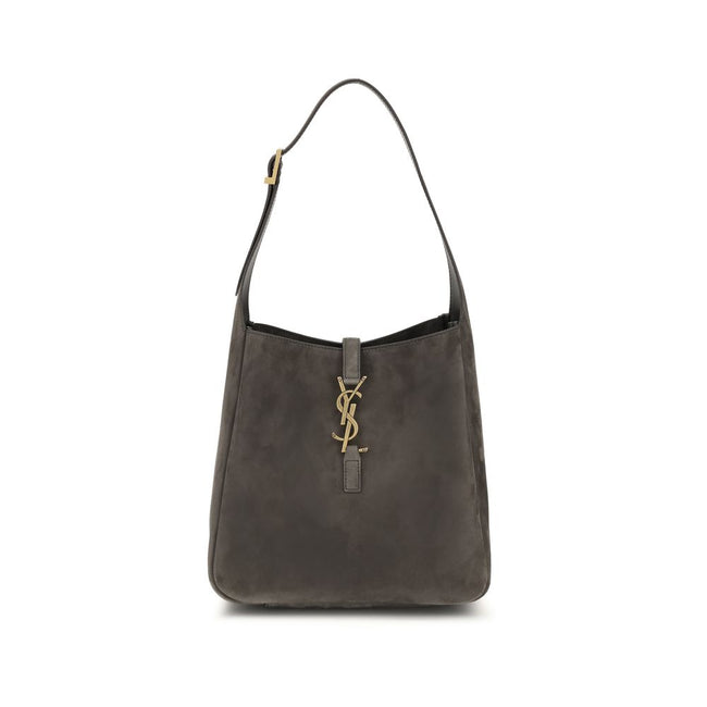 Gray Calf Leather Bos Taurus Shoulder BagThe Le 5 à 7 suede Shoulder Bag by Saint Laurent is a sophisticated and practical design perfect for any occasion. The bag features a removable zippered clutch, ideal for keeping smaller items in order. The leather