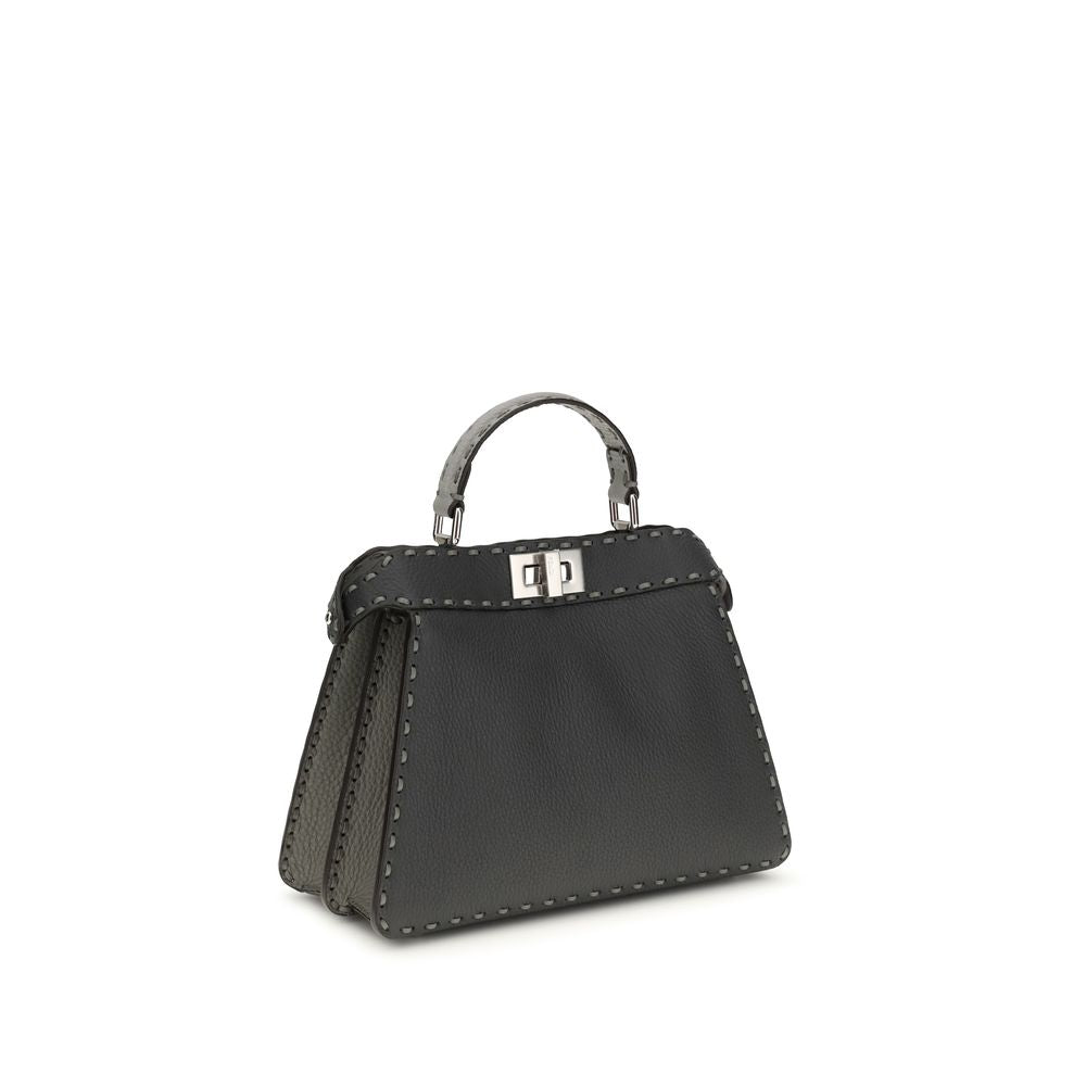 Gray Leather Shoulder BagThe Peekaboo ISeeU small Handbag by Fendi is crafted from brown Cuoio Romano leather with cappuccino-colored side panels, featuring a natural grain achieved through a metal-free tanning process.The leather-lined interior is divide