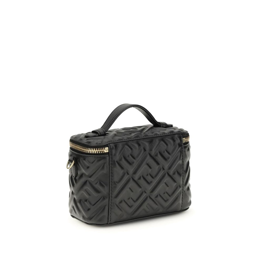 Black Calf Leather Bos Taurus HandbagVanity Handbag by Fendi is an elegant leather accessory featuring an embossed FF motif that decorates the entire surface, enhancing the house’s iconic design. Equipped with a flat leather handle and a removable shoulde