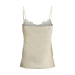 Cream Silk TopThe washed silk satin and lace Camisole by Chloé embodies delicate and refined femininity. Crafted from pure washed silk satin, it features a fluid silhouette with thin straps and lace inserts that add a romantic touch. The style can be worn