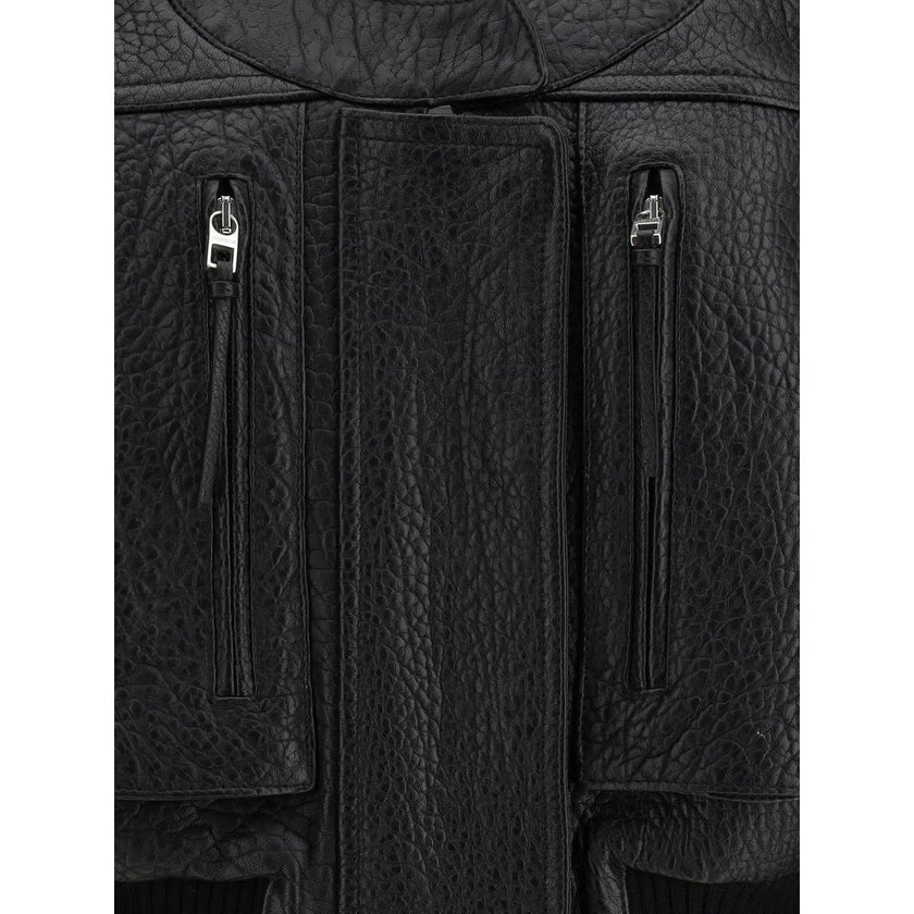 Black Lamb Leather SweatshirtThe Tore Bomber by Jacquemus, crafted from supple hammered lamb leather, merges craftsmanship with contemporary design for a piece of distinctive character. The concealed front closure with zip and snap buttons, paired with a